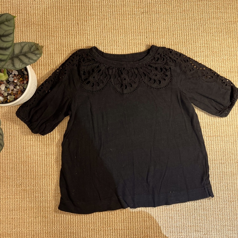 Black shortsleeved eyelet fabric cutouts LOFT top